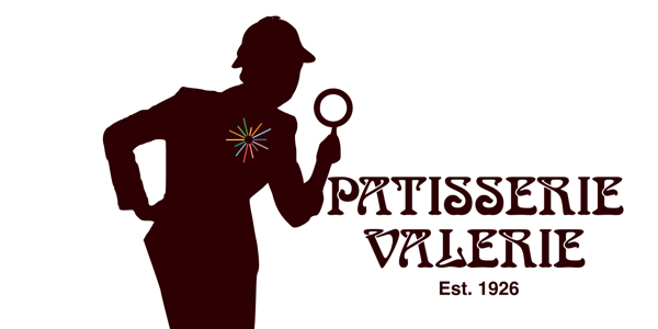 The Patisserie Valerie logo under the scrutiny of a detective and her magnifying glass.